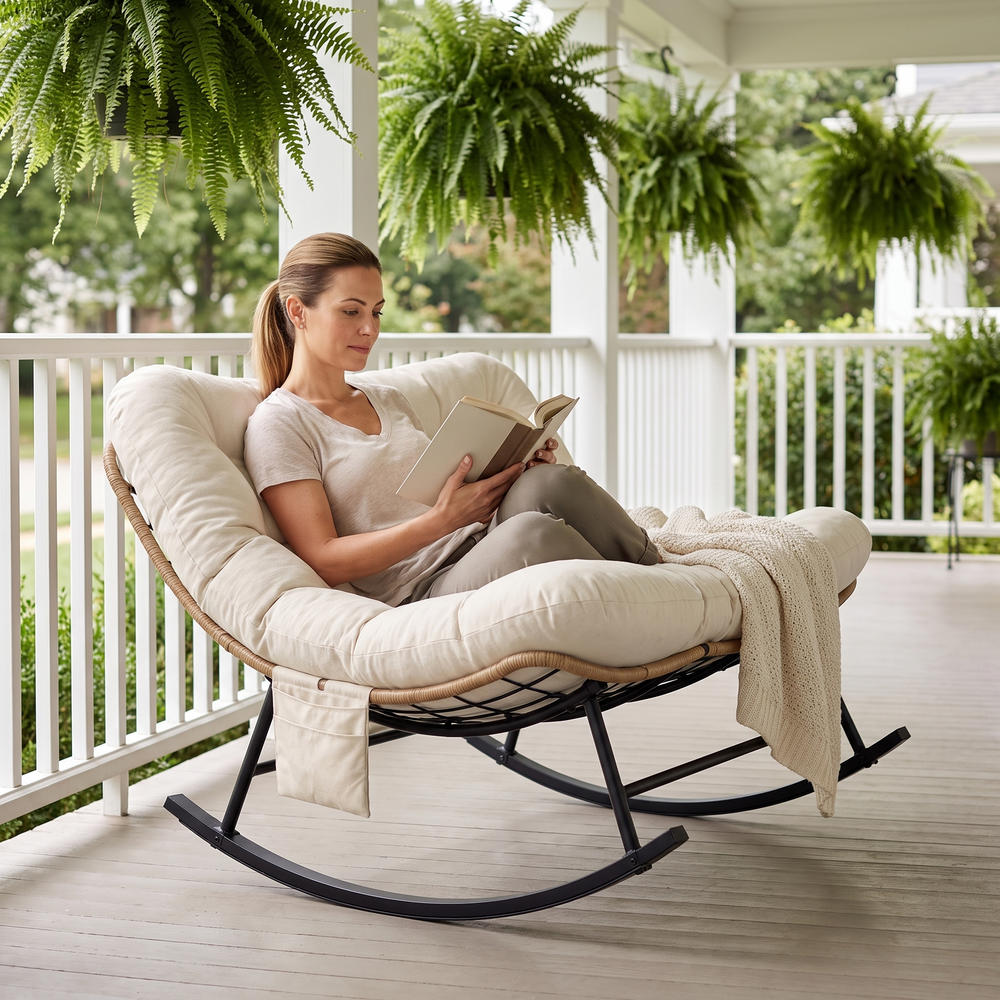 Woman relaxing, in The Tandem 2-Seat Rocking Loveseat in a classic front porch