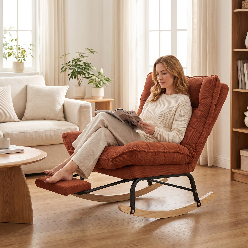 Woman relaxing, in The Slumber Reclining Rocker + Footrest, 90 to 180 Degrees in a sunny living room
