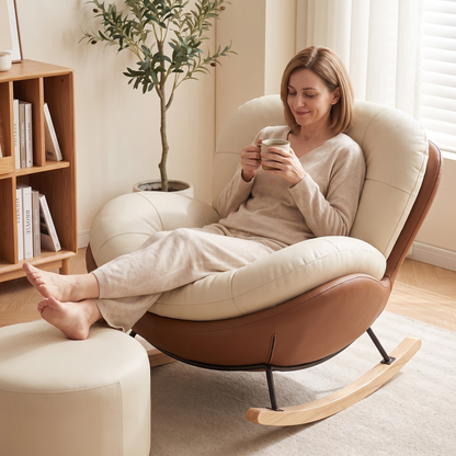 Woman with her feet up on the ottoman, in The Nook shell rocker in a sunlit reading corner