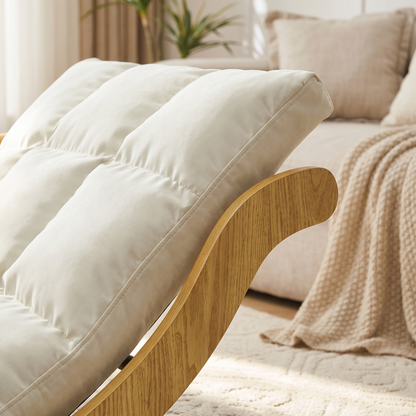 Close-up of The Crescent: bent wood frame and quilted cushion