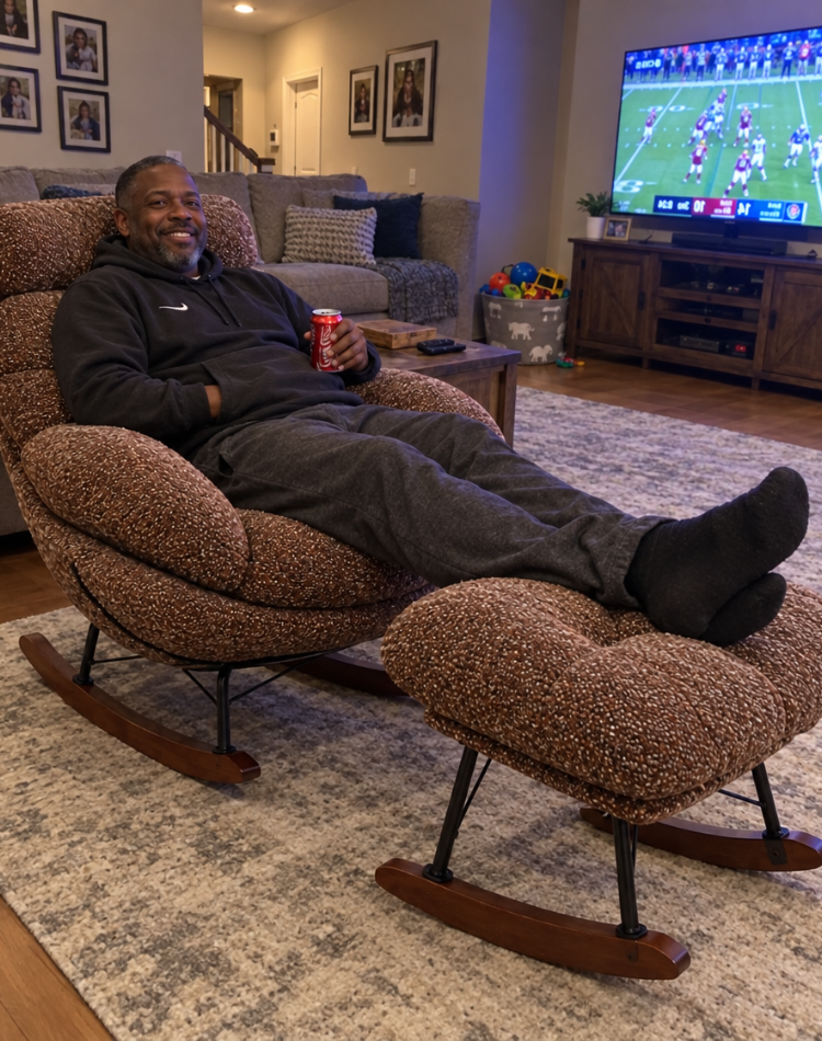 Man relaxing in a brown boucle rocking chair with footrest during a football game