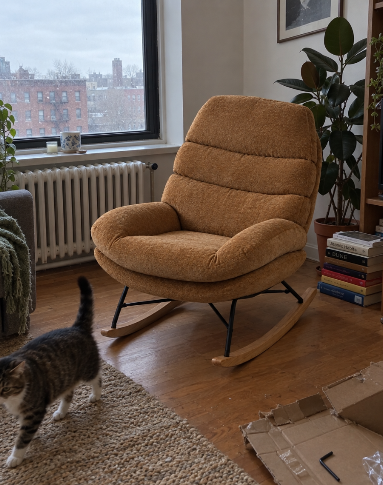 Mustard ribbed rocking chair in a city apartment, a cat walking by