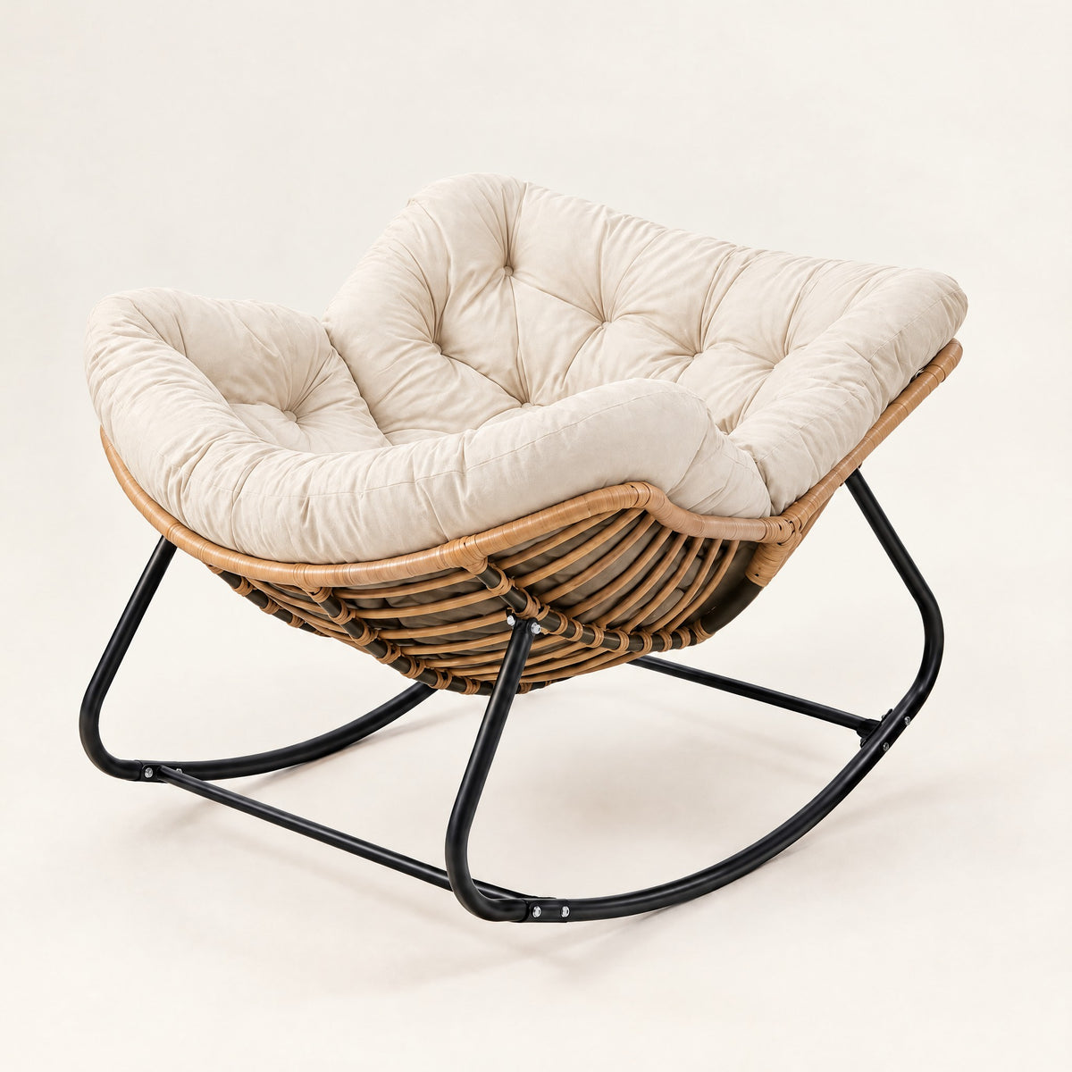 The Cabana indoor-outdoor rattan rocker in Ecru, studio photo