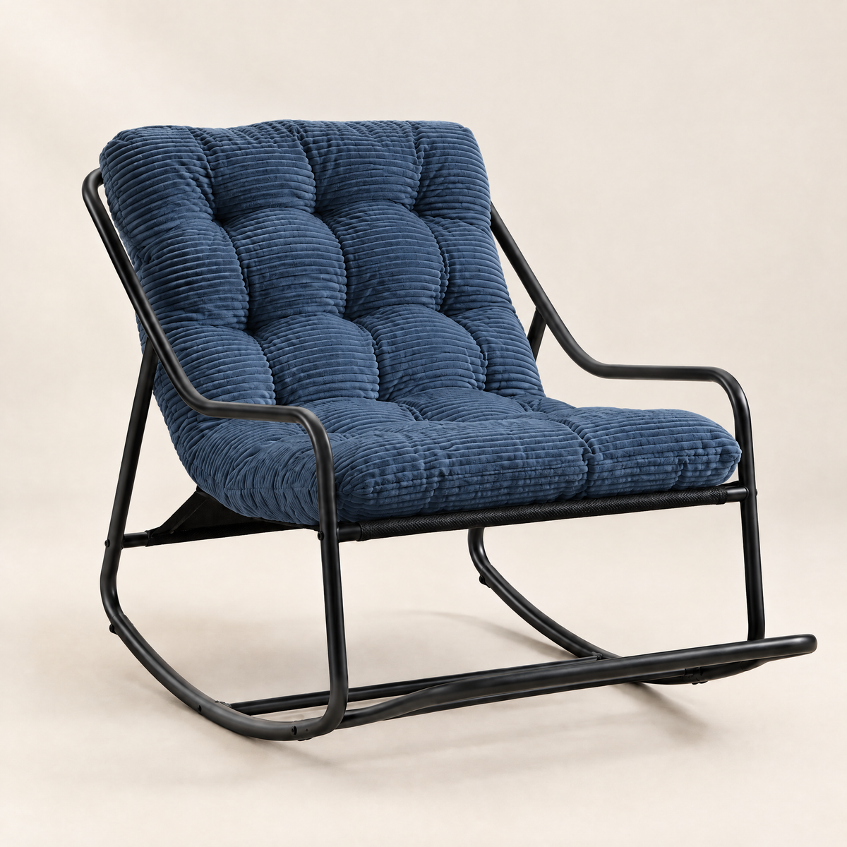 The Dune low lounge rocker, tufted corduroy in Blue, studio photo