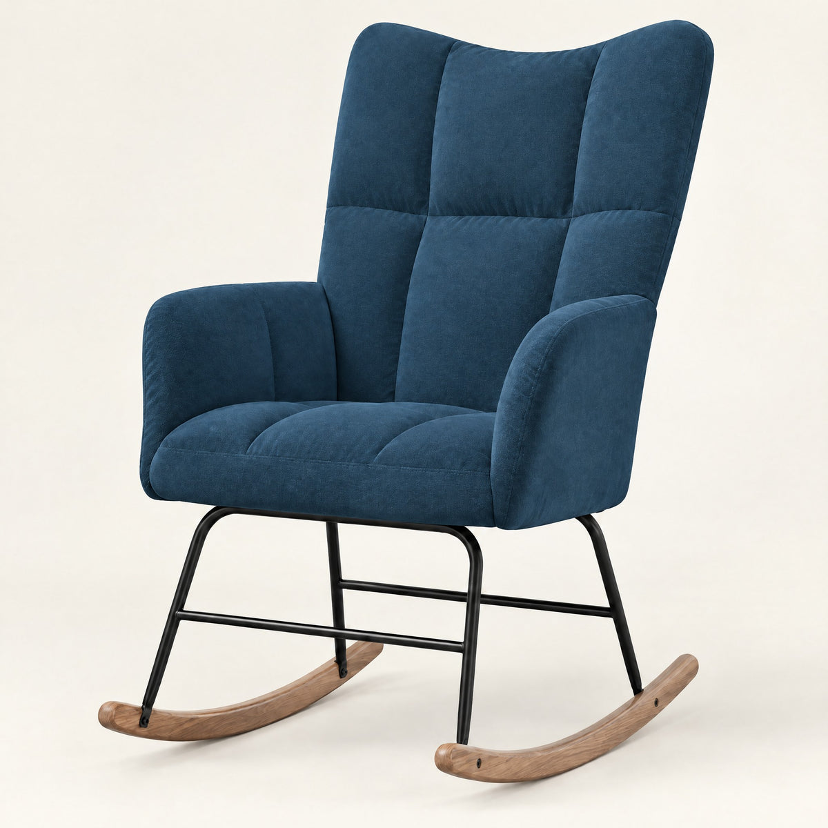 The Poppy tufted velvet wingback rocker in Denim Blue, studio photo