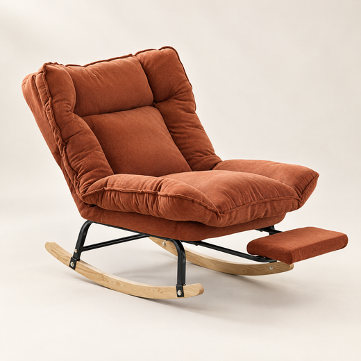 The Slumber reclining rocker + footrest, 90 to 180 degrees in Terracotta, studio photo