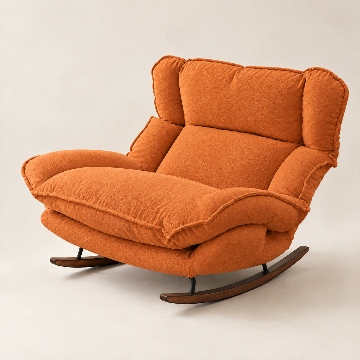 The Sunday 5-position reclining rocker in Orange, studio photo