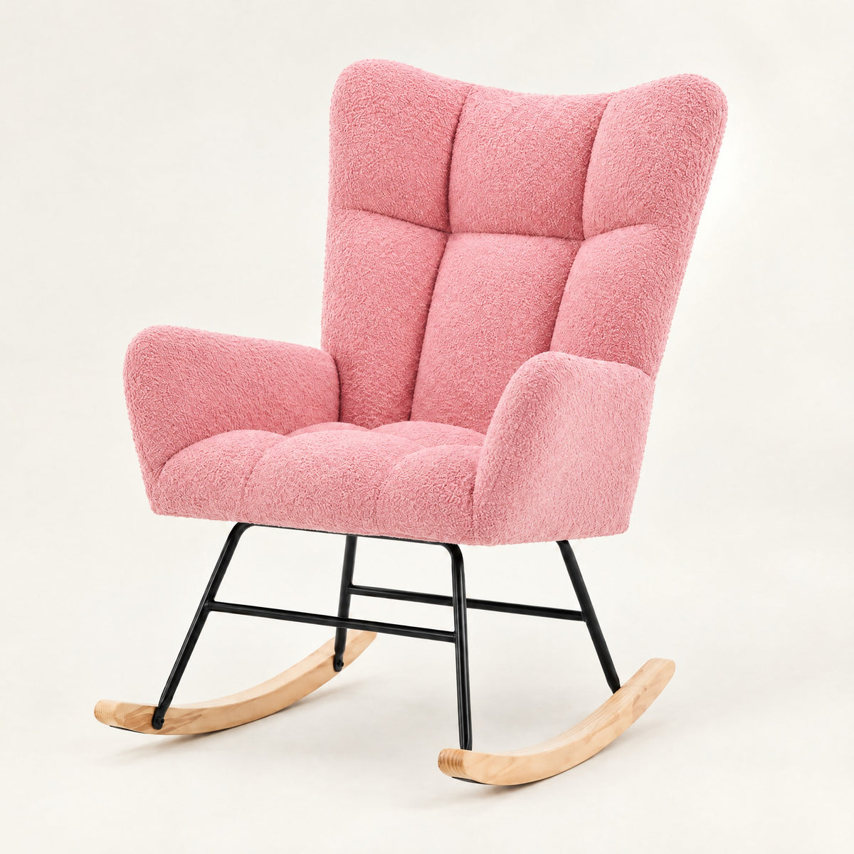 The Winslow boucle wingback rocker in Pink, studio photo
